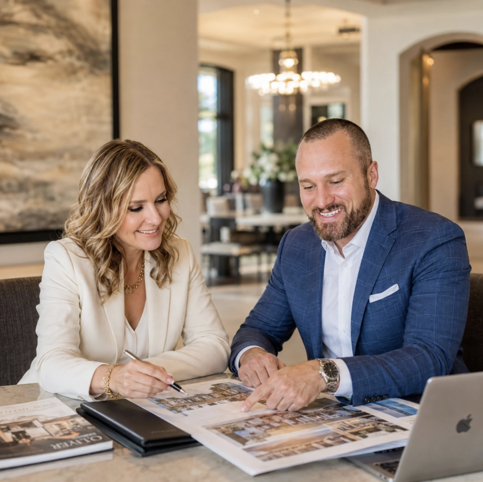 Heather and Michael Oliver in the Oliver Realty office